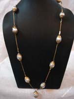 white-golden-beads