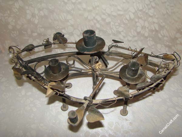 Iron boat candle holder