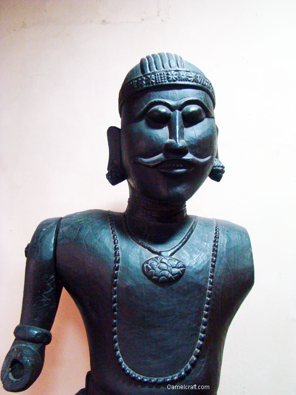 Statue of a man, black sculpture, an example of old Indian Art and craft