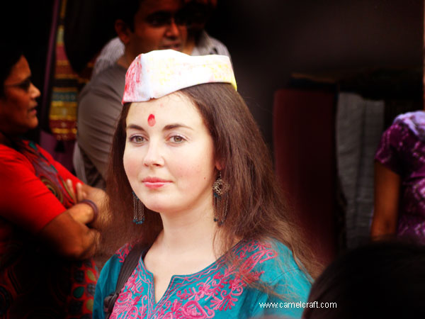 A visitor at Dillihaat participating in Holi celebration at Delhi